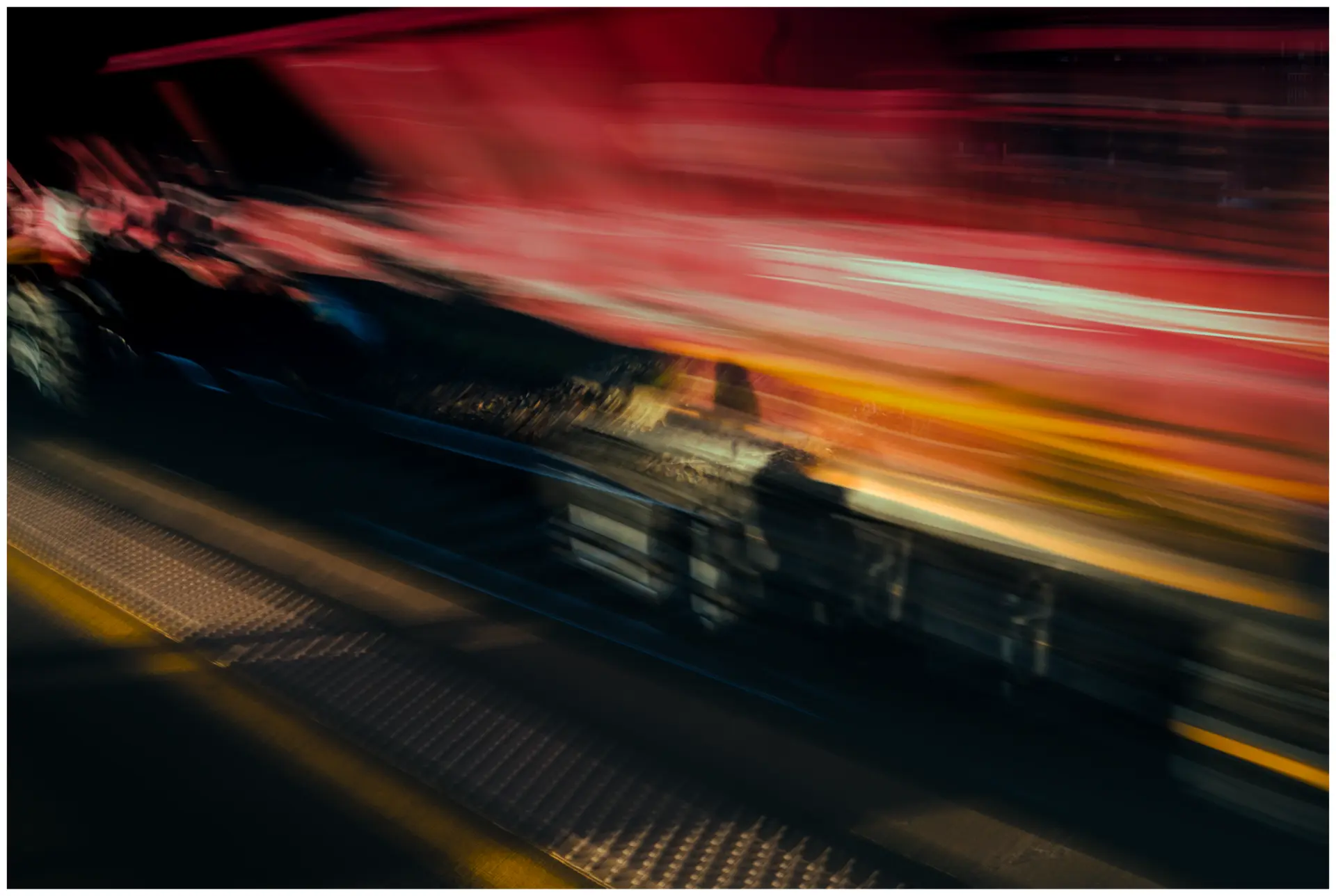 Abstract motion-blurred photograph in red and yellow tones